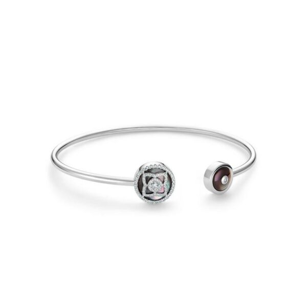 De Beers Wedding day jewellery Enchanted Lotus bangle in white gold and mother-of-pearl